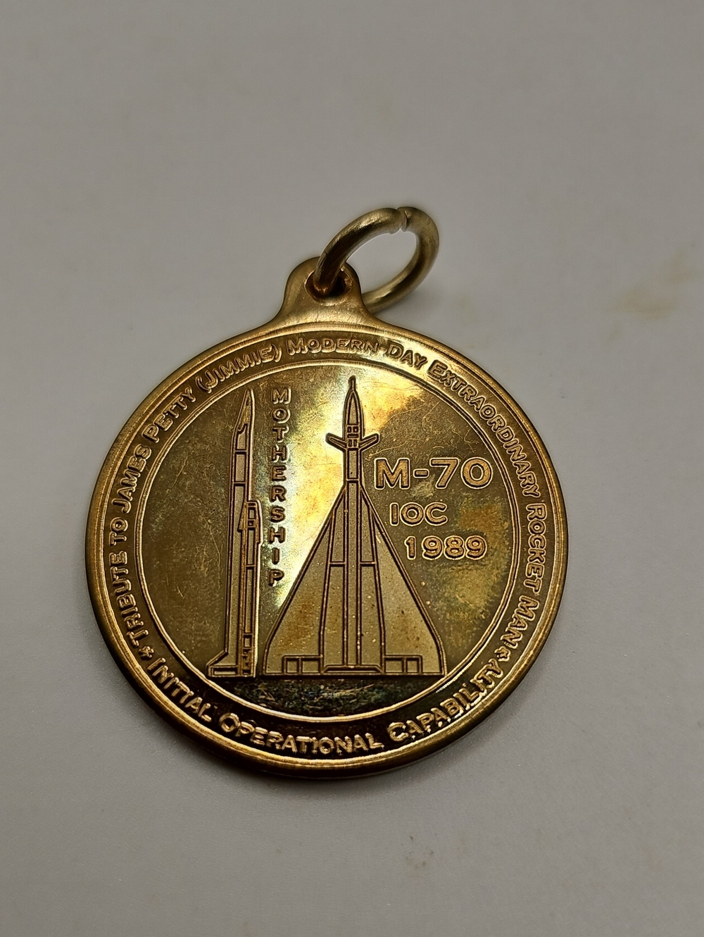 Gold M-70 Rocket Commemorative Pendant. D-70 James Petty 1989